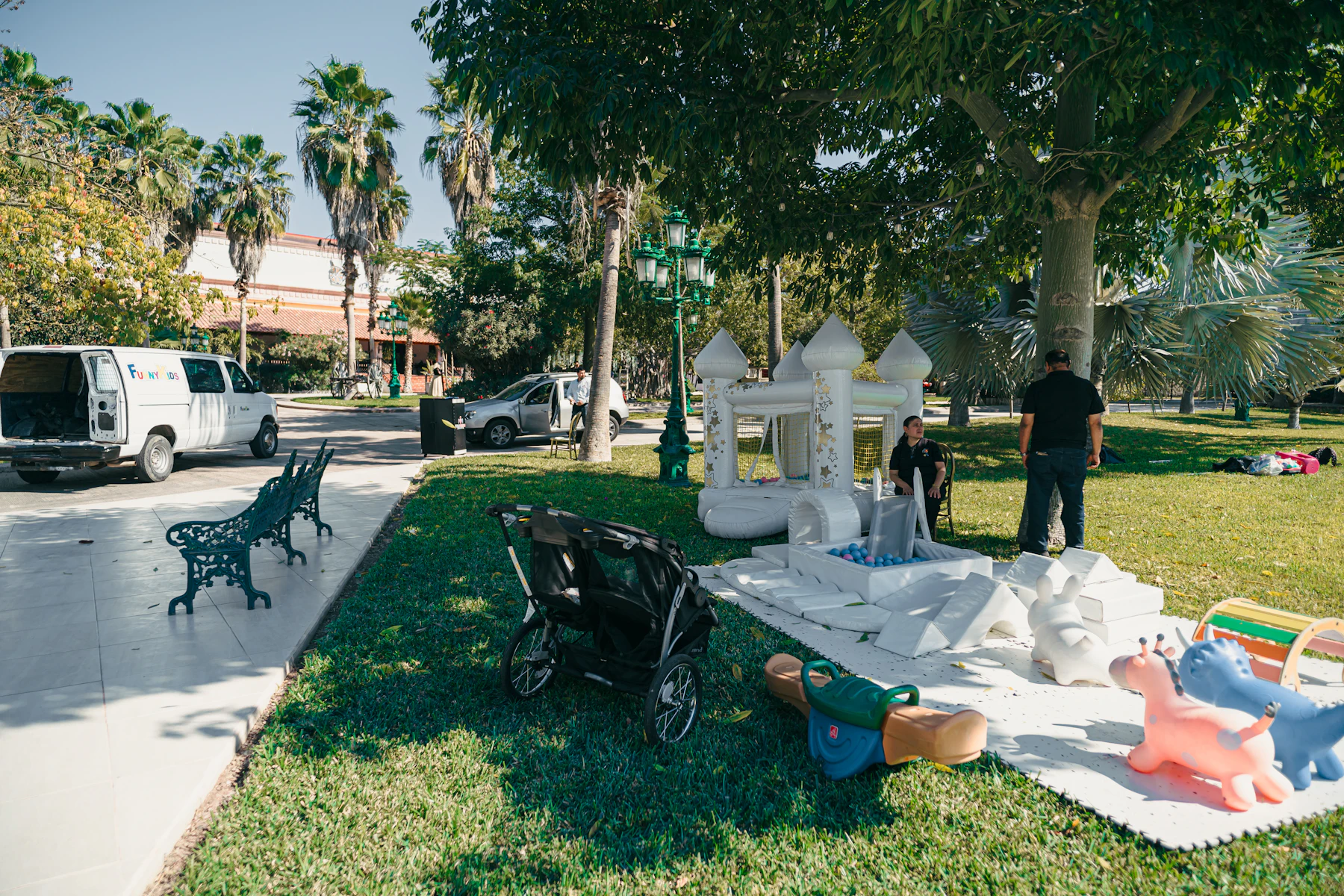 A commercial inflatable bounce house set up for an outdoor family event